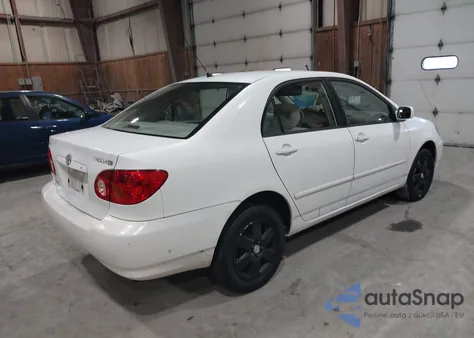 2003 Toyota Corolla Le z USA, uszkodzony, nr VIN JTDBR32E330020921